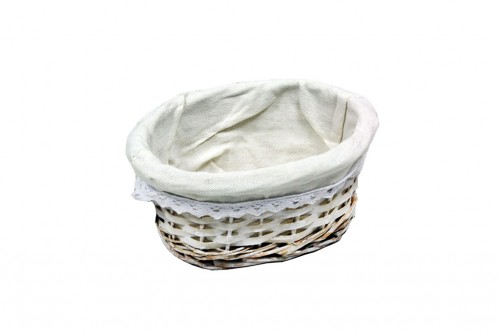 Panier ovale en osier blanc avec tissu blanc