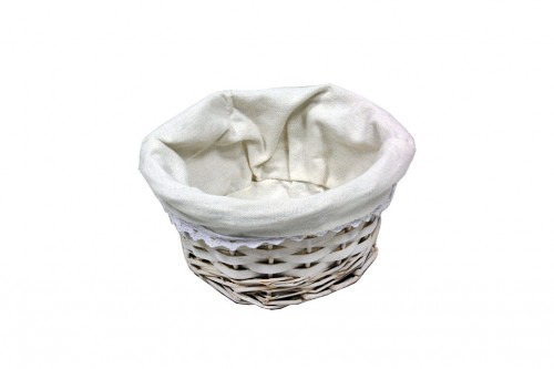 Oval white wicker basket w/ white cloth