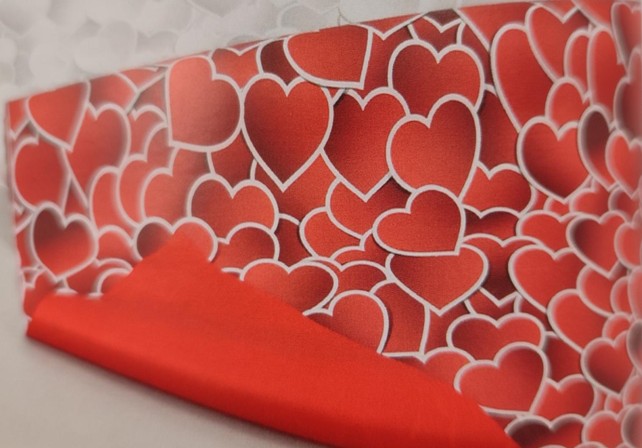 Rollo doble cara contraste rojo-corazon h. 70*50 mt.