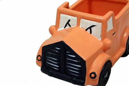 Planteur de camion orange