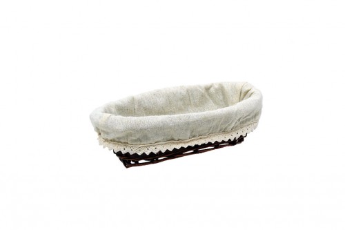 Oval brown wicker basket w/ white cloth