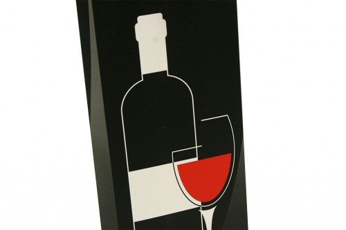 Cardboard bag bottle wine black background