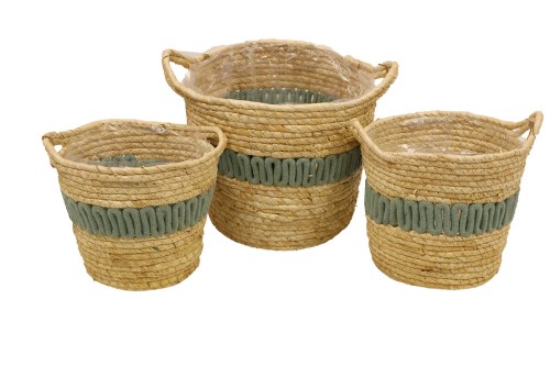 Seagrass planters with blue details and handles